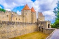 Porte Narbonnaise leading to the old town of Carcassonne, France