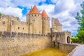 Porte Narbonnaise leading to the old town of Carcassonne, France