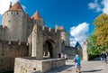 Porte Narbonnaise and turists at Carcassonne