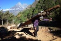Porter carries super heavy load in Himalayas mountains. Everest trek, Nepal