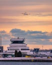 Porter propellor airplane on approach to Billy Bishop Airport at sunset. De Havilland Canada Dash 8 Q400