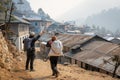 Porter on Trail in Phakding Nepal Royalty Free Stock Photo