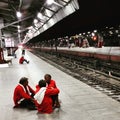 Porter waiting for the Train at Night Royalty Free Stock Photo