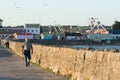 People enjoy the sun at Porthcawl, South Wales, UK.