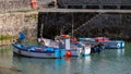 View of boats in the harbour in Porthleven, Cornwall on May 11, 2021 Royalty Free Stock Photo