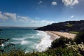 Porthminster beach St Ives Cornwall England with white waves and blue sea and sky Royalty Free Stock Photo