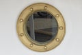 Porthole at a ship - brass frame Royalty Free Stock Photo