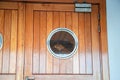 Porthole in the door on the ship. Cruise Ship Design Royalty Free Stock Photo