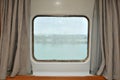 Porthole of an inside cabin on a cruise ship Royalty Free Stock Photo