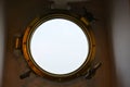 Porthole from the inside on a ship Royalty Free Stock Photo