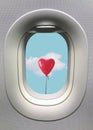 Porthole window with red heart balloon with white cloud on blue sky. Minimal love concept