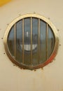 Porthole window on a ship. Royalty Free Stock Photo