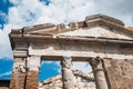 Portico of Octavia Portico di Ottavia is an ancient structure with blue sky with white clouds background in Rome, Italy