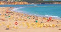 public beach in portugal on hot sunny day