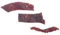 Portion of beef jerky pieces isolated on white background, top view Royalty Free Stock Photo