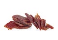 Portion of beef jerky on white white background. Full depth of field Royalty Free Stock Photo
