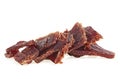 Portion of beef jerky on white white background. Full depth of field Royalty Free Stock Photo