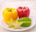 Portion of Bell Peppers and Star Apples Royalty Free Stock Photo