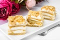 Portion cake of puff pastry with vanilla butter cream Royalty Free Stock Photo