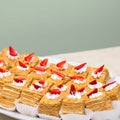 Portion cakes with strawberries and cream. Sweet food, dessert