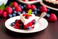 Portion of cheese cake with strawberries and blueberries, AI generative Royalty Free Stock Photo
