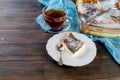 Cottage cheese casserole . Pie with cheese and cup of tea