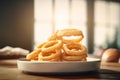 portion of crispy fried onion rings on rustic wooden table. AI generated