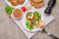 Portion of delicious chicken aspic on a plate isolated on concrete table