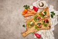 Portion of delicious chicken aspic on serving board on concrete table