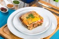 Portion of delicious layered moussaka on plate, close-up