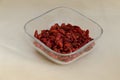 Portion of dried ripe Goji Berries or Wolfberry fruit in a small bowl