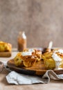 Portion Dutch baby pancakes with apples served with cream, honey and cinnamon. Delicious sweet breakfast Royalty Free Stock Photo