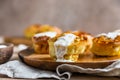 Portion Dutch baby pancakes with apples served with cream, honey and cinnamon. Delicious sweet breakfast Royalty Free Stock Photo