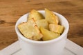 Portion of fresh baked sweet potato wedges. Royalty Free Stock Photo