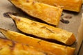 Portion of fresh baked sweet potato wedges Royalty Free Stock Photo