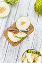 Portion of Fresh Futuro Melon on wooden background selective fo Royalty Free Stock Photo