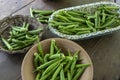 Portion Of Freshly Picked Okra Over Bowls Of Different Materials