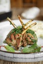 Portion of gourmet lamb cutlets with rice