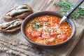 Portion of green lentil tomato soup with toasts Royalty Free Stock Photo