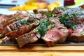 Portion of grilled beef chateaubriand with herbs