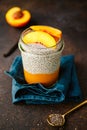 Portion healthy vegan chia pudding with almond milk, vanilla and peaches