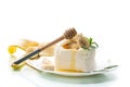 Portion of homemade milk curd with banana slices and honey