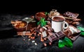 Portion of homemade mint hot chocolate in a cup with chocolate and nuts