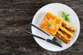 Portion of italian lasagna on plate Royalty Free Stock Photo