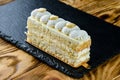 Portion of layered creamy cake, cake layers