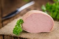 Portion of Liverwurst German cuisine on wooden background sel Royalty Free Stock Photo