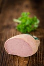 Portion of Liverwurst German cuisine on wooden background sel