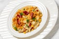 portion of mac and cheese with corn, bacon topped with panko breadcrumbs Royalty Free Stock Photo