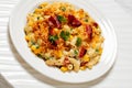 portion of macaroni and cheese with corn, bacon topped with panko breadcrumbs Royalty Free Stock Photo