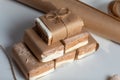 Portion marshmallow with cocoa and cranberries. Wrapped in paper and tied with string. Two-layer zephyr Royalty Free Stock Photo